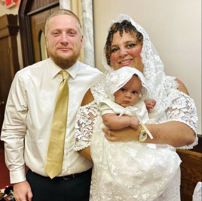 James Higginbottom with his wife and daughter