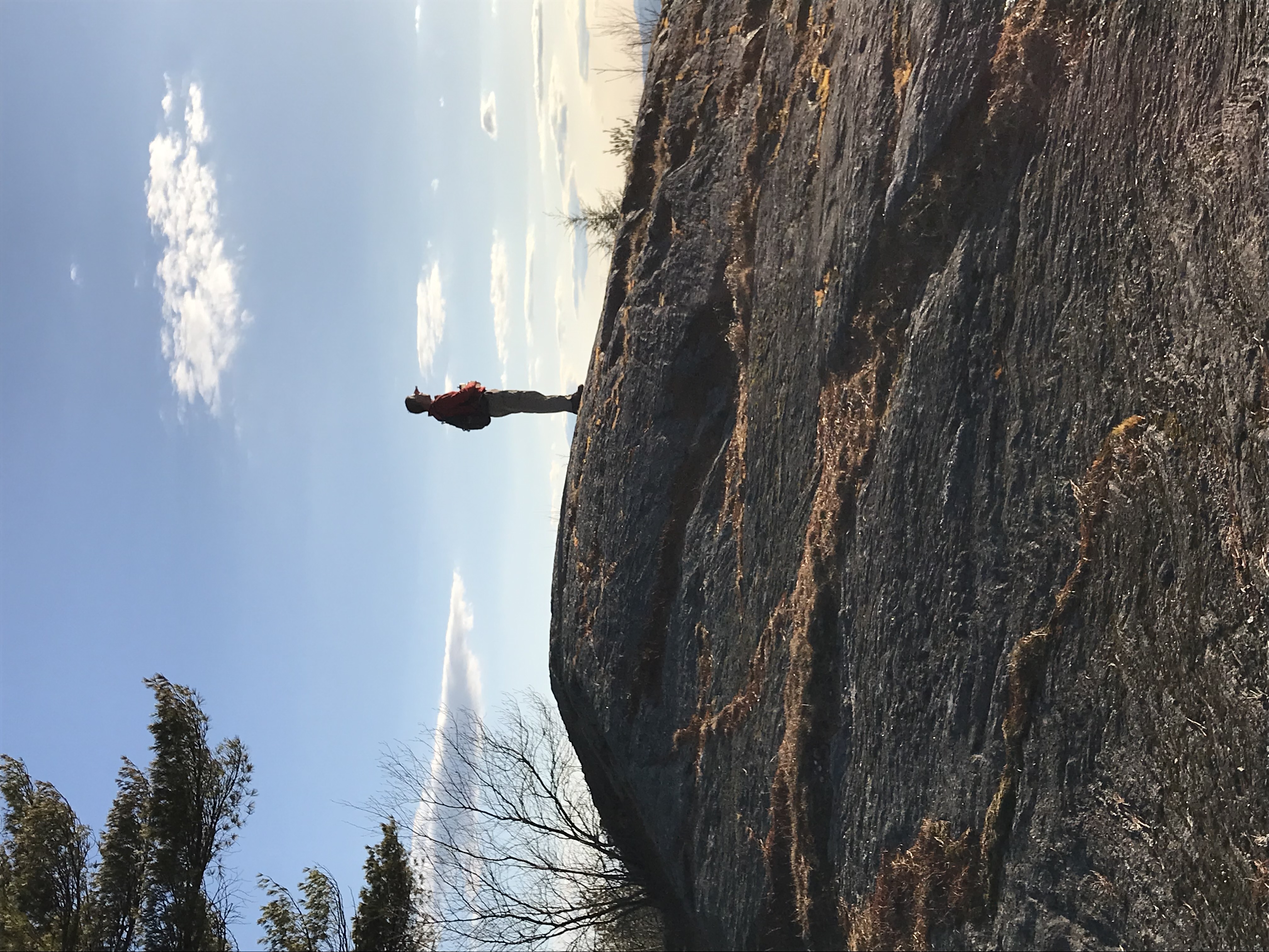 A hiker atop NH Mt. Pleasant