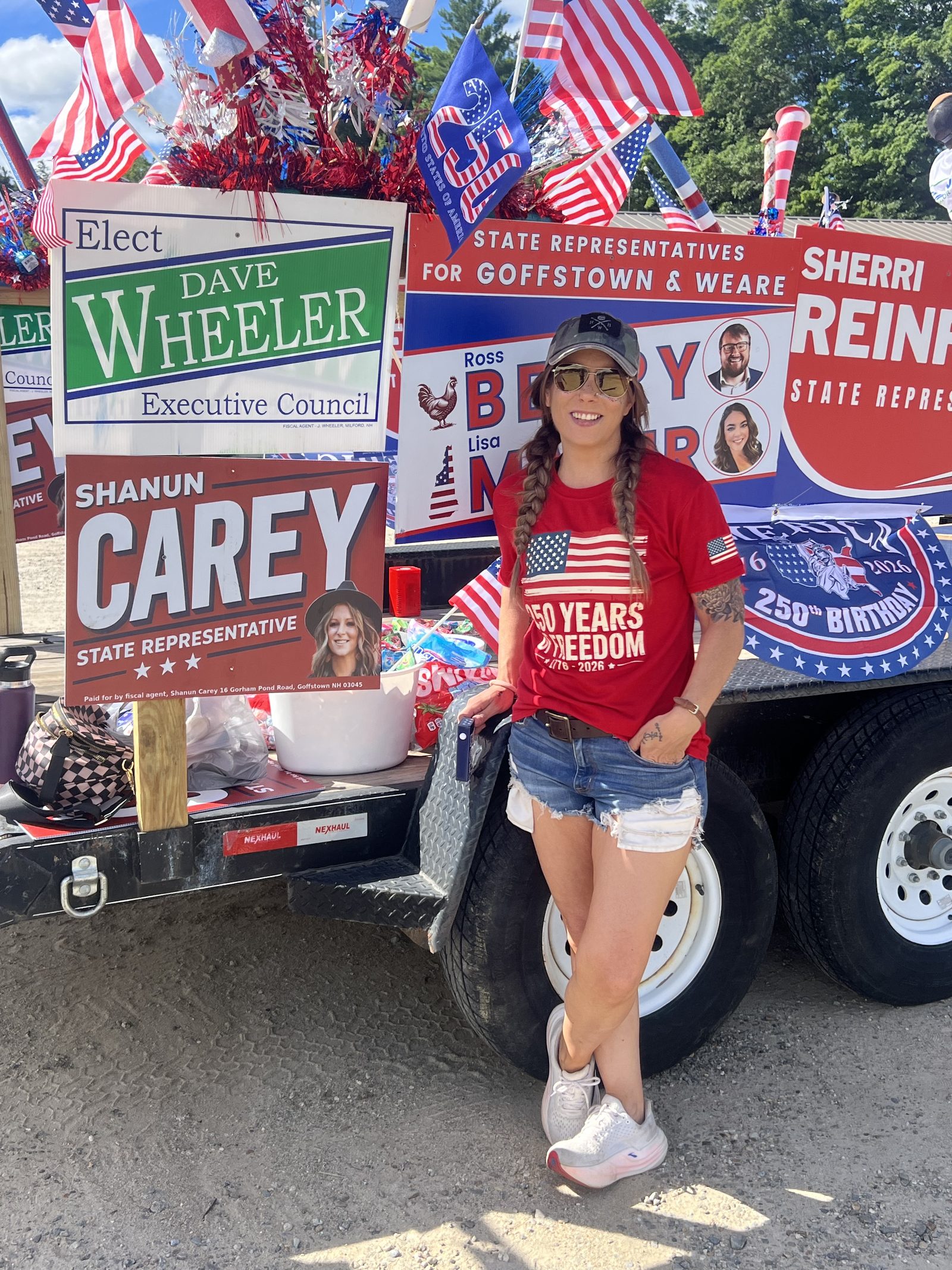 Shanun Carey with campaign signage