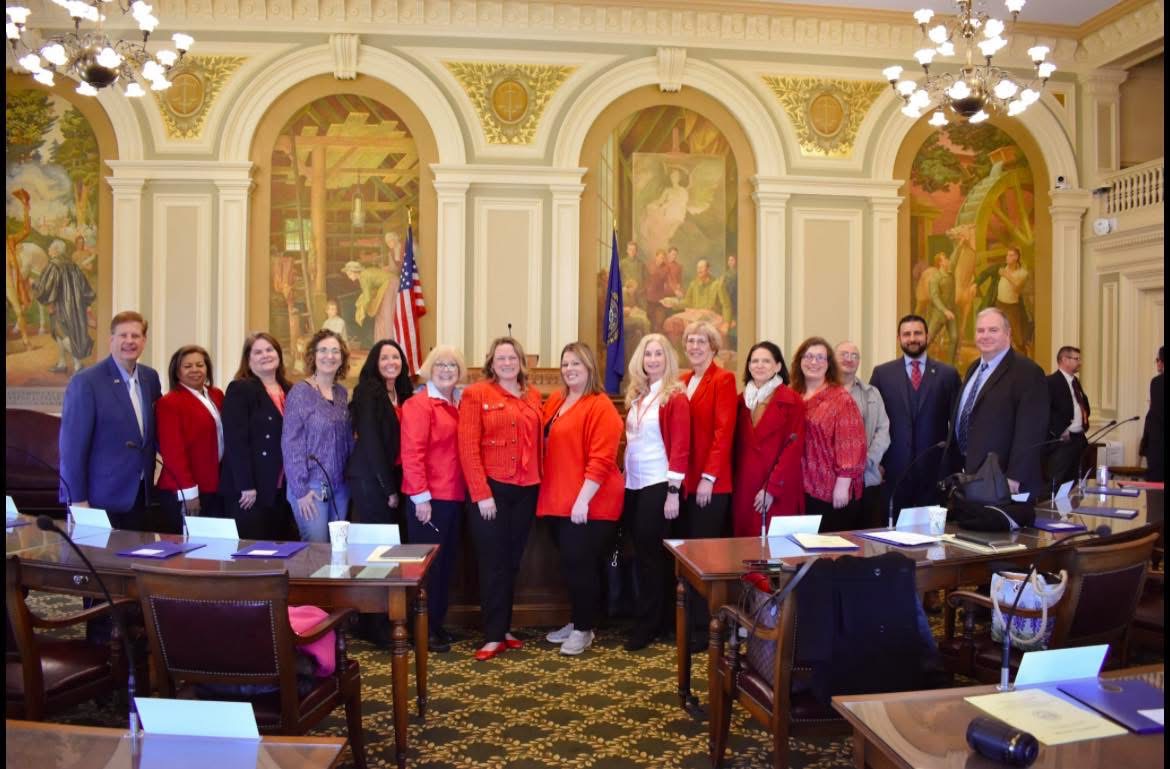 Sayra with legislative colleagues