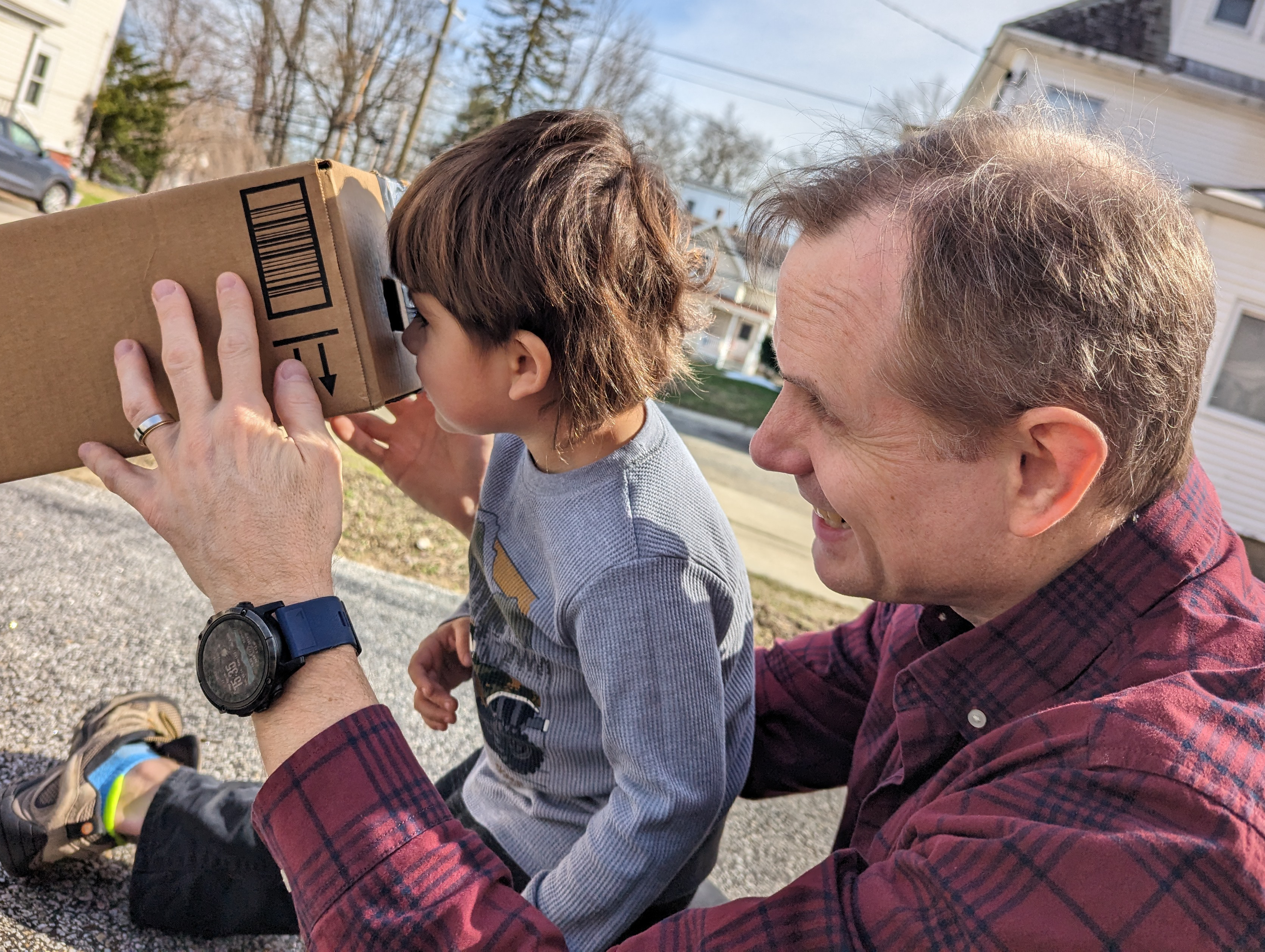 Mickey Mullin with a child in the neighborhood